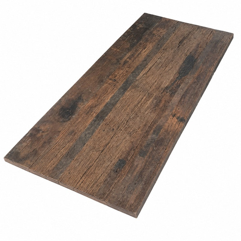 Tafelblad van donker gebruikte houten planken.